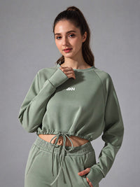 Zara-Flow Training Shirt in Green – women's long sleeve drawstring sports shirt