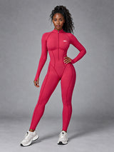Nora-Zip Sculpt Suit in Raspberry Red – women's long sleeve zip yoga bodysuit
