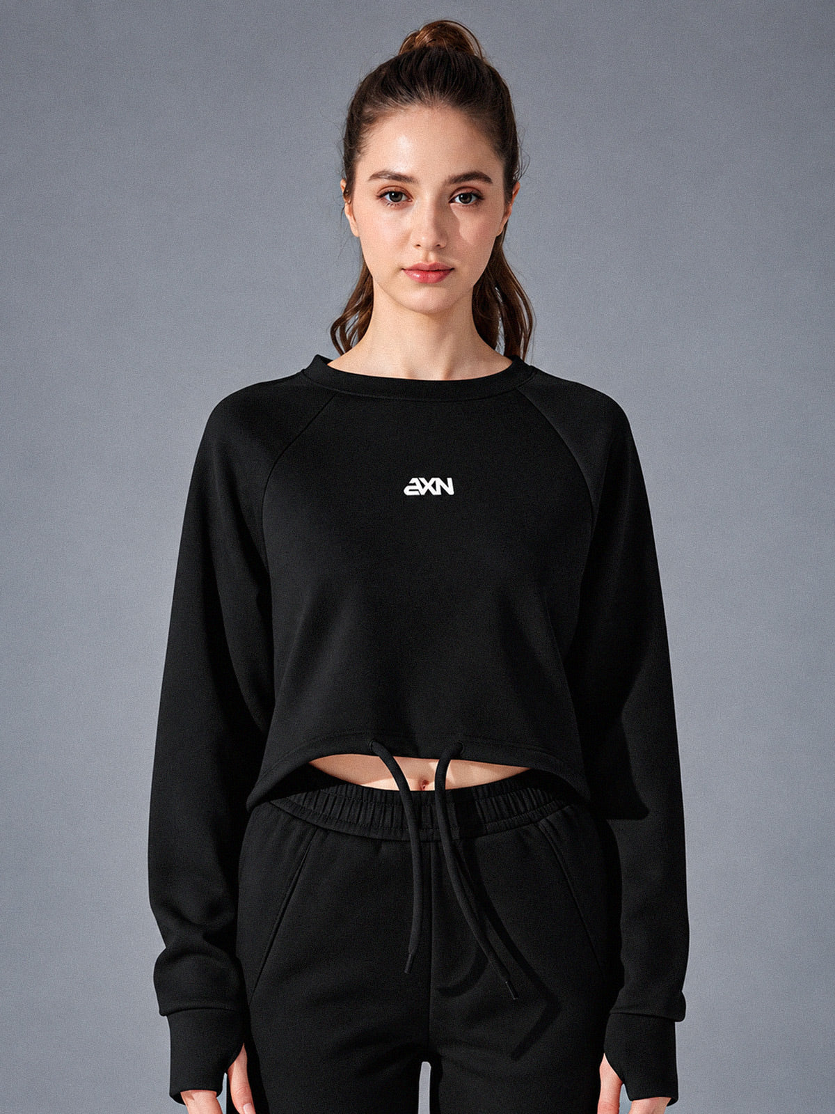 Zara-Flow Training Shirt in Black – women's long sleeve drawstring sports shirt