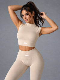 Celia-High Neck Top in Beige – women's high neck seamless sports bra