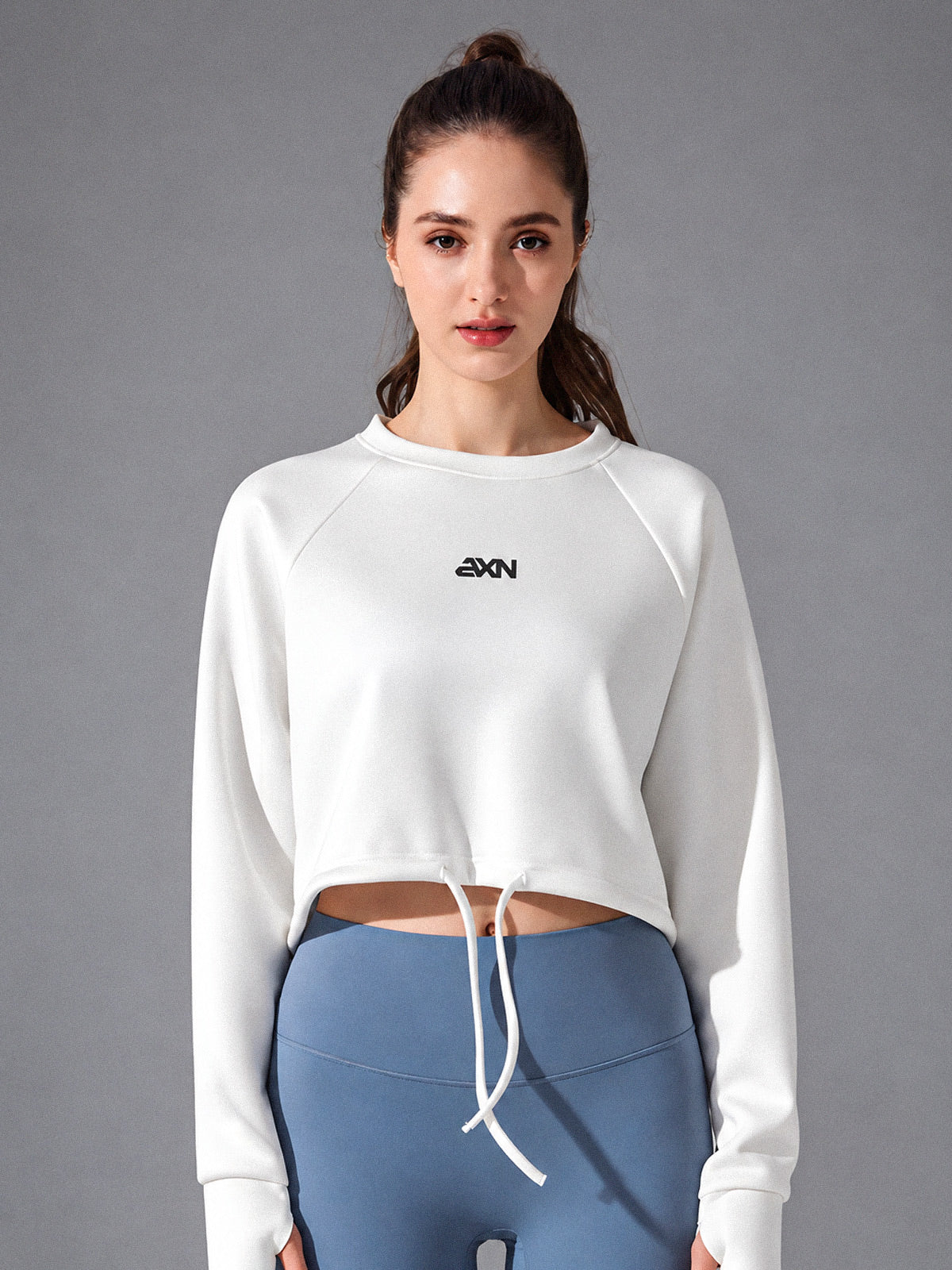 Zara-Flow Training Shirt in White – women's long sleeve drawstring sports shirt
