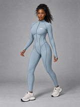 Nora-Zip Sculpt Suit in Sea Blue – women's long sleeve zip yoga bodysuit