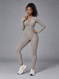 Nora-Zip Sculpt Suit in Beige – women's long sleeve zip yoga bodysuit